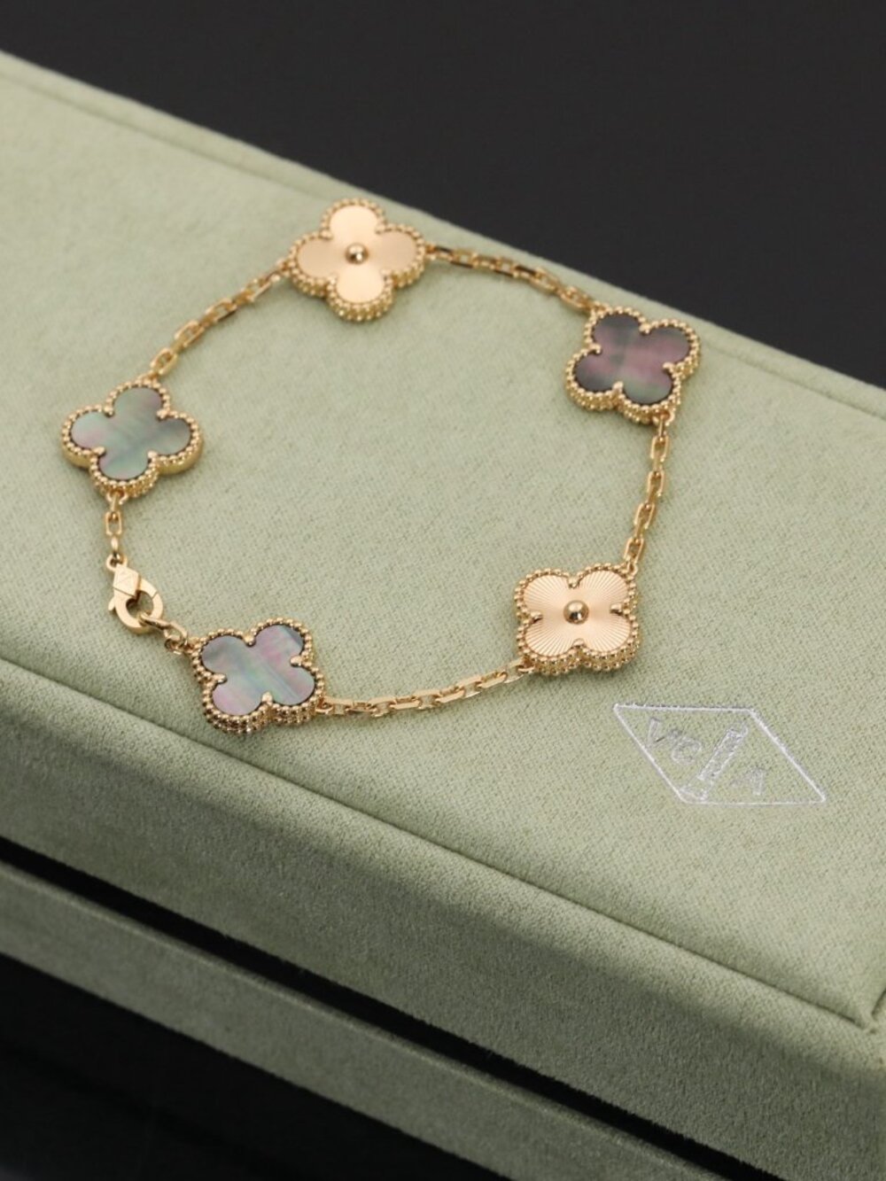 Van Cleef & Arpels Gold Clover Link Bracelet with White Mother-of-Pearl Accents